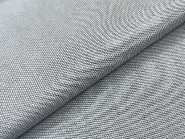 Close-up of 100% OE cotton single jersey knit fabric